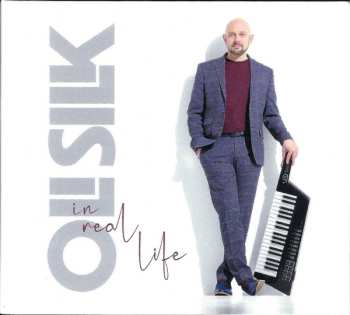 CD Oli Silk: In Real Life